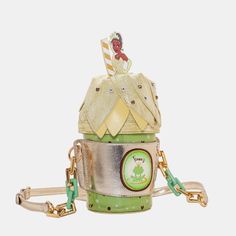 Danielle Nicole Disney The Evening Star Frappuccino Crossbody Tiana Bag Still In Plastic Sip On Sweet Style With The Tiana Frappucino Crossbody. Shades Of Green Mixed With White And Gold Accents Make For A Hoppin’ Look. Featuring Your Favorite Bayou Princess In The Form Of A Delicious Drink, This Whimsical Piece Is Made To Turn Heads. A Chunky Accent Chain And Adjustable Strap Allows Versatility For The Bag To Be Hand-Held Or Worn Over Your Shoulder. Make A Wish, Hold On Tight, And Accessorize W The Evening Star, Danielle Nicole Disney, Walt Disney Princesses, Princesa Tiana, Minnie Mouse Backpack, Evening Star, Sweet 16 Decorations, Toy Story Buzz Lightyear, Mermaid Under The Sea