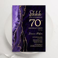 an elegant purple and gold 70th birthday party