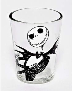 a shot glass with the character jack skellingy on it's face and arms