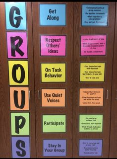 the door to an office that has several different colored notes on it, including words and phrases