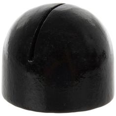 a close up of a black object on a white background