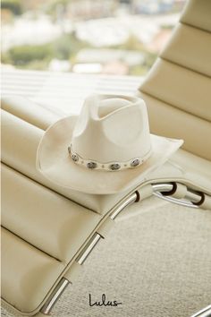 The Lulus Rodeo Cutie Ivory Suede Cowboy Hat doesn't just have us feeling excited, we're practically giddy (up)! Faux suede shapes this festival-ready cowboy hat that has a cute bent brim and a fedora silhouette with a teardrop-shaped crown. A tonal faux leather band features silver conch embellishments that wraps around the base of the crown for a classic finish. 3. 25" hard brim. 23" interior circumference. Crown measures 5" tall. 90% Polyester, 10% PU. Imported. Lulus | Rodeo Cutie Ivory Sued White Flat Crown Hat For Rodeo, Custom White Hat For Rodeo, Cream Brimmed Hat For Rodeo, Beige Western Hat For Rodeo, Cream Western Hat With Flat Crown, Feeling Excited, Lulu Fashion, Long Lashes, Cowgirl Hats