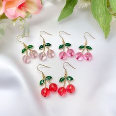 "This listing is for a pair of light pink, pink, or red cherry charm earrings with gold plated stainless steel hooks. Great for sensitive ears! Earrings are about 2\" in total length x 7/8\" wide." Bing Cherries, Cherry Earrings, Jewelry Care Instructions, Trendy Earrings, Red Earrings, Silver Plated Jewelry, Star Earrings, Charm Earrings, Cute Jewelry