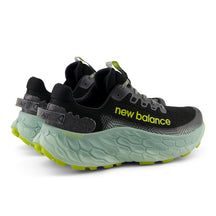 Men's More Trail V3 Dynamic Breathable New Balance Running Shoes, Black Trail Running Shoes With Vibram Sole For Jogging, New Balance Sneakers With Vibram Sole For Outdoor Activities, New Balance Outdoor Sneakers With Vibram Sole, Low-top Sneakers With Air Max Cushioning For Trail Running, Green Low-top Trail Running Shoes For Jogging, Green Running Shoes With Air Cushioning For Sports, Athleisure Running Sneakers With Vibram Sole, Sporty Synthetic Running Shoes For Hiking