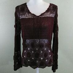 This Lovely, Classic Sweater Is Done In A Lacy Open Crochet With Floral Medallion Accents And A Scalloped Bottom. There Are Ties At The Neckline, And The Sleeves Flare Out As They Near Their End. From Armpit To Armpit It Measures Approx. 21", And From Shoulder To Hem It's 24". The Color Is A Deep Burgundy; It Shows True On My Devices But I Can't Be Responsible For Variations In Color Caused By Different Screens. No Lowball Offers! This Is A $145 Sweater! Fall Crochet V-neck Top With Crochet Trim, Fitted Crochet Long Sleeve Top, Fall V-neck Crochet Top With Crochet Trim, V-neck Crochet Top With Crochet Trim For Fall, Fitted Long Sleeve Crochet Top For Fall, Fitted Long Sleeve Crochet Top For Festival, Long Sleeve Open Knit Sweater For Festival, Fitted Bohemian Crochet Top For Fall, Bohemian Fitted Long Sleeve Crochet Top