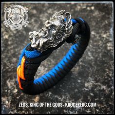 Detailed bead of Zeus, the Greek King of the Gods, ruler of heaven, with the lightning in his hands. Your choice of bead in white brass, oxidized or gold colored. Single or dual colored eccentric fishtail with lightning stitch and original bar closure. Weave Colors, Paracord Armband, Blue Orange White, Stylish Hoodies, The Lightning, Paracord Bracelets, Orange Gold, His Hands, Paracord