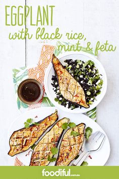 grilled eggplant with black rice, mint and feta on white plates