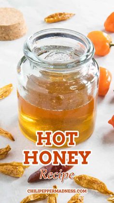 a jar filled with honey sitting on top of a table