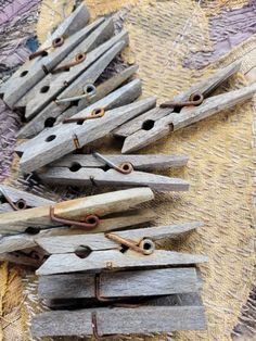 several pieces of wood that have been made to look like clothes pegs