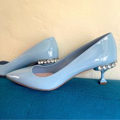 Brand New With Dustbag But No Box Or Tags Attached. Pale Blue Pointed Toe Miu Miu Patent Leather Heels. Heels Have Silver And Crystal Embellished Detailing At The Top Of The Enamel Squared 2” Heel. Fit True To Size, Like An 8.5. Guaranteed Authentic. Embellished Heels, Miu Miu Shoes, Patent Leather Heels, Pale Blue, Leather Heels, Miu Miu, Shoes Women Heels, Patent Leather, Shoes Heels