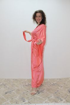 A long kimono robe will decorate your wardrobe and become a great addition to your clothes. Suitable as a gift for a best friend. The robe is sewn from silk satin. You can choose the color in the options. Also, if you need other size parameters, contact me and we will solve everything) Pink Wrap Dress With Tie Waist, Long Summer Party Robe, Pink Wrap Dress For Beach, Pink Party Kimono, Pink Robe With Kimono Sleeves For Wedding, Pink Kimono Sleeve Wedding Dress, Pink Dresses With Kimono Sleeves For Wedding, Pink Long Dress For Loungewear, Long Pink Robe For Wedding