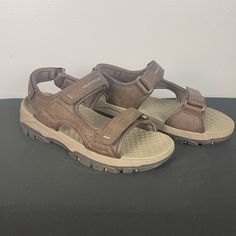 Brown Earthy Toned Strappy Velcro “Relaxed Fit Luxe Foam” Sketchers Sandals Perfect For Outdoor Wear In The Warm Months. I Can Personally Attest To How Comfortable And Supportive These Particular Sandals Are Because I Have Several Pairs In My Own Closet. This Item Has Been Gently Worn And Does Not Have Tags. In Excellent Condition; Even The Velcro Itself Is In Nearly Unused Condition. Brand: Sketchers Size : 9 Men’s Bundle To Save $$$ Casual Brown Synthetic Sport Sandals, Brown Synthetic Open Toe Sport Sandals, Brown Synthetic Sport Sandals With Round Toe, Brown Synthetic Round Toe Sport Sandals, Brown Sport Sandals With Ankle Strap For Beach, Brown Ankle Strap Sport Sandals For Beach, Brown Casual Sport Sandals With Arch Support, Casual Brown Sport Sandals With Arch Support, Brown Beach Sport Sandals With Buckle Closure