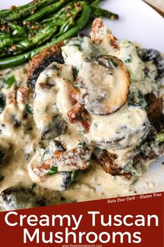 creamy tuscann mushrooms and asparagus on a plate with gravy