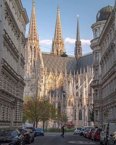 the large cathedral has many spires on it's sides