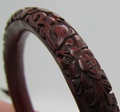 "Antique Chinese 1890-1910 Victorian Era Carved Floral Bracelet In Cinnabar The bracelet measures 3 3/8\" in diameter and 7/16\" wide." Yellow Quilts, Vintage Kate Spade, Floral Bracelet, Quilted Handbags, Fort Lauderdale, Victorian Era, Chain Strap, Cuff Bracelets, Fort