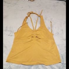 Awesome Tank Super Cute Is Kinda Short Depending How Tall U R...Me Its To Short N Im 5 Ft 9..So If You Need Measurements Just Ask..Great Deal N Ofeers R Welcome..Please Check Out All Pictures N Descriptions N If You Have A Question Please Feel Free To Ask...Great Look Boho Or Whatever U Got Going On... Fitted Gold Tops For Beach, Yellow Stretch Crop Top For Summer, Mustard Tops For Spring Vacation, Fitted Gold Top For Beach, Fitted Gold Top For The Beach, Fitted Yellow Tops For Vacation, Casual Yellow Beach Tops, Gold Summer Tops For Day Out, Gold Fitted Tops For Vacation