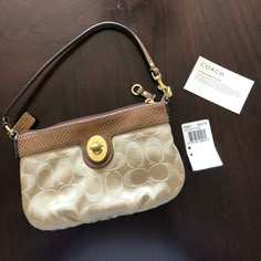 Nwt Coach Signature Collection Large Wristlet. Also Can Be Used As A Small Shoulder Bag (But Tag Is Labeled Large Wristlet). Tan/Khaki/Nutmeg Color. See Photos For Measurements. A Couch Purses, Coach Sierra, Coach Messenger Bag, Coach Parker, Vintage Couch, Coach Leather Bag, Coach Tote Bags, Convertible Crossbody Bag, Dream Bags