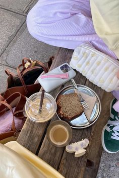 a person sitting at a table with food on it