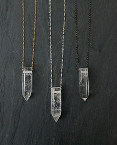 "Quartz crystal pendant on a custom length chain and your choice of: gunmetal, gold filled or sterling silver chain. Quartz is the most abundant mineral in the world and is known as the master healing crystal amplifying stability and healing. Quartz also provides clarity and positivity. Each crystal is made by mother nature and will have natural flaws and beautiful imperfections. Your one-of-a-kind necklace will arrive in a gift box, and on a hang tag noting its properties. Stone: Quartz Color: Raw Quartz Necklace, Crystal Ball Necklace, Quartz Crystal Jewelry, Anthropologie Jewelry Earrings, Crystal Point Necklace, Rose Gold Quartz, Raw Crystal Necklace, Quartz Crystal Pendant, Raw Quartz