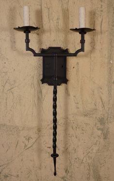 The Valencia Torch Sconce are unique sconces that take inspiration from vintage sconces. Shows off an intricately twisted rope design. Vintage Sconce. Unique Sconces, Vintage Sconces, Hand Forged Iron, Rope Design, Vintage Iron, Iron Wall