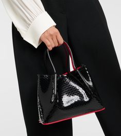 Cabarock Mini patent leather tote bag in black - Christian Louboutin | Mytheresa Louboutin Bag, Louboutin Online, Louboutin Bags, Rubber Sneakers, Black Leather Tote Bag, Adjustable Bag, Christian Louboutin Women, Mini Tote Bag, Mini Tote