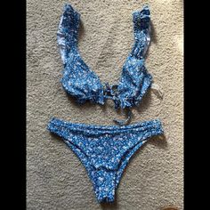 Blue Floral Ruffle Bikini - Never Worn Blue Ruffled Swimwear For Vacation, Blue Ruffled Swimwear For Poolside, Blue Ruffled Swimwear For Sunbathing, Blue Ruffled Swimwear For Beach, Blue Ruffled Swimwear For Beachwear, Blue Ruffled Swimwear For Beach Season, Blue Ruffled Swimwear For Summer, Floral Ruffle, Blue Floral