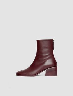 Leather Ankle Boots in Burgundy | JOSEPH US Burgundy Ankle Boots, Joseph Fashion, Pool Party Outfits, Burgundy Boots, High Neck Jumper, Winter 2024, Leather Ankle Boots, Nice Shoes, Minimalist Fashion