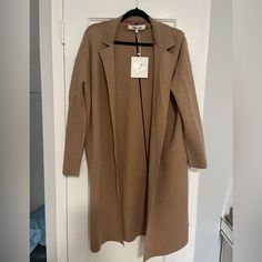 Dvf Camel Sweater Coat New With Tags. Size Medium. Originally $648. In Excellent Condition Other Than An Area Where It Was Being Hung Is Sticking Out A Bit As Seen In The Last Photo. Not As Noticeable When It’s On. Camel Lapel Collar Outerwear For Work, Camel Business Outerwear, Camel Long Sleeve Business Outerwear, Beige Lapel Collar Cardigan For Work, Beige Lapel Collar Sweater Coat For Work, Camel Sweater, Camel Sweaters, Sweater Coat, Sweater Coats