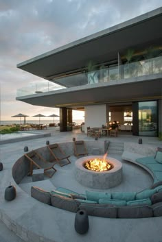 a fire pit sitting in the middle of a patio