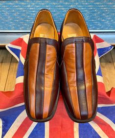 Fabulous sartorial pair of original vintage 1970s shoes made in England by County. Really fab dandy mod shoes and in vgc ,probably only been worn once or twice. These would have been at the height of style back in the day with the likes of Peter Wyngarde and his dandy 70s suits wearing similar shoes. These are a UK 7 A USA 8 Euro 41 Heel height is near 4.5cm Please check out my other vintage pieces  My Generation Vintage on instagram and Facebook Retro Brown Round Toe Loafers, Retro Brown Loafers With Round Toe, Fitted Brown Moc Toe Loafers, Brown Moc Toe Loafers Comfort Fit, Retro Leather Loafers For Work, Retro Leather Slip-on Shoes, Fitted Brown Leather Slip-on Shoes, Retro Brown Wingtip Leather Shoes, Vintage Brown Slip-on Loafers