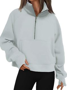 Solid Half Zip Sweatshirt Casual Half-zip Top With Kangaroo Pocket, Athleisure Half-zip Tops With Pockets, Solid Tops With Pockets For Leisure, Solid Leisure Tops With Pockets, Leisure Solid Tops With Pockets, Solid Color Tops With Pockets For Leisure, Sporty Tops With Pockets For Leisure, Casual Half-zip Sweatshirt With Pockets, Fleece Half-zip Top With Pockets