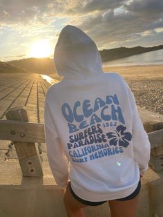 "Ocean Beach Hoodies Tees and Hoodies for Women Summer Aesthetic Surf Hoody California y2k Hoodies Oversize Shirt Beachy Sweatshirt Xmas Gift 🌊ABOUT THIS HOODIE🌊 \"OCEAN BEACH\" design printed on the back SIZE UP OR SIZE DOWN ∙ Hoodie is UNISEX and runs slightly large for ladies (size up for a loose boyfriend style, size down for a more fitted style) ∙ 50% cotton, 50% polyester blend fabric ∙ Colours may vary based on your monitor or screen display --- HOW TO ORDER --- 1) Choose the listing/de Winter Vsco Hoodie With Letter Print, White Y2k Hoodie With Letter Print, Cotton Vsco Hoodie With Graphic Print, Cotton Graphic Print Vsco Hoodie, Y2k Style White Graphic Print Hoodie, Y2k White Graphic Print Hoodie, White Y2k Graphic Print Hoodie, Y2k White Hoodie With Graphic Print, White Oversized Y2k Hoodie