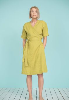 "Linen wrap dress with dolman sleeves falls just below the knees creating feminine, subtle, casually elegant look. Express your freedom, radiate your natural beauty and charm wearing it this summer! Suitable for any time of the day during hot season and super comfortable for maternity period. DETAILS - Loose-fit style - V neckline - Short dolman sleeves - Wide sleeves - Long waist ties - Side seam pockets - 100% midweight European softened (washed) linen fabric - Oeko Tex certified linen - Cut a Casual Wrap Midi Dress With Tie Waist, Casual Summer Wrap Midi Dress, Casual Wrap Dress With Tie Waist, Spring Wrap Dress With Tie Waist, Wrap Dresses With Tie Waist For Daywear, Elegant Mid-length Summer Wrap Dress, Green Linen Summer Dress For Work, Casual Linen Wrap Dress With Tie Waist, Linen Dress With Tie Waist And Surplice Neckline