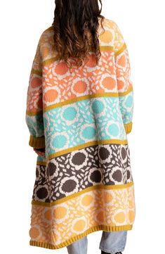 Patterned colorblocking brings boho appeal to this supersoft cardigan flanked by oversized patch pockets. Open front Long sleeves Front patch pockets Ribbed cuffs and hem 100% acrylic Hand wash, line dry Imported Retro Color Block Cardigan For Fall, Oversized Multicolor Bohemian Sweater Coat, Multicolor Oversized Bohemian Sweater Coat, Retro Fall Color Block Cardigan, Bohemian Oversized Cardigan With Pockets, Oversized Bohemian Cardigan With Pockets, Oversized Color Block Knit Outerwear, Oversized Multicolor Open Front Cardigan, Cozy Oversized Patchwork Cardigan