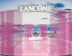 a glass display case with the words lancome on it