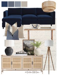 a living room with blue furniture and accessories