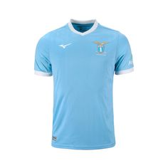 a blue soccer jersey with an emblem on the chest