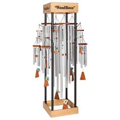 an old wind chime with many bells hanging from it's sides and the word wind river on top