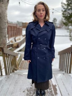 Vintage Navy Blue Classic Trench Coat by Pierre Cardin. Size is 38 T (Tall) Lovely designer trench coat, made well and has the original belt. Longer in the arms and length slightly. Fantastic vintage condition. Measured flat and in inches. Pit to pit - 20 in Waist - 20 in Hips - 22 in Sleeve - 26 in Length shoulder to hem - 46 in Single Breasted Raincoat For Workwear, Classic Long Sleeve Raincoat For Work, Fitted Raincoat For Winter Workwear, Fitted Winter Raincoat For Work, Classic Business Raincoat For Winter, Winter Workwear Raincoat Single Breasted, Classic Winter Business Raincoat, Fitted Winter Workwear Raincoat, Classic Long Sleeve Raincoat