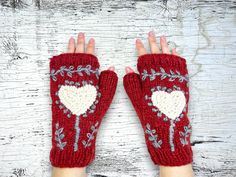 Hand Knit Fingerless Gloves Wool Snowboard Skiing Texting Mittens Fleece Lined Unique Gifts for Her Anniversary, Birthday, Christmas, Graduation or Mother's Day Beautiful hand knit texting fingerless gloves mittens. Fleece lined wool hand warmers.  Knitted style created from wool sourced in the Himalayas.  Each fingerless glove is an entirely handmade work of art in rich colors.  The gloves are 100% wool with micro fleece lining for softness and extra insulated warmth. Experience their luxury for autumn and winter.  They make a lovely  or birthday gift.  A unique stocking stuffer,  secret Santa, or white elephant under $50 for a friend, mother, daughter, wife, sister, or girlfriend. Designed in our studio by the sea in North Carolina. Handcrafted in Nepal.   DIMENSIONS (Inches): Size: Adul Unique Stocking Stuffers, Unique Gifts For Her, Birthday Woman, White Elephant, Rich Colors, Mitten Gloves, Stocking Stuffer, Secret Santa