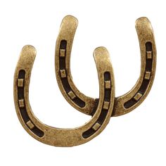 two gold horseshoes on a white background