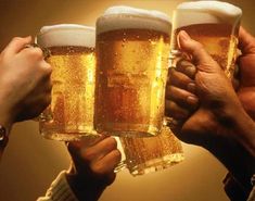 three people holding up mugs of beer with the word west virginia on each one