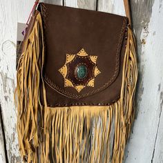 Brand New With Tags Gypsies + Debutantes Crossbody Bag. Perfect Festival Bag!! Bag Features An Adjustable Strap, Authentic Guatemalan Jade Medallion, Magnetic Closure, Zippered Pocket On The Reverse Side. All G+D Bags Are Made From Authentic Leather And Suede. Artisan Brown Bag With Fringe, Brown Artisan Bags With Fringe, Artisan Brown Bags With Fringe, Artisan Brown Fringe Bag, Traditional Brown Fringe Bag, Brown Pouch Bag For Festivals, Brown Festival Pouch Bag, Handmade Brown Bags For Festival, Vintage Rectangular Fringe Bag