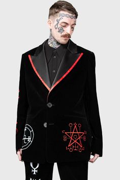 BEELZEBUB.- Statement non-stretch velvet fabric.- Contrasting satin collar.- Statement custom embroidery details.- XL peaked lapels.- Functional welt pockets.- Button down closure.- Classic suit jacket sillhouette.- Fitted.- Unisex, so it's for everyone! with KILLSTAR branding, Fabric 1: 100% Polyester. Trim: 97% Polyester, 3% Elastane. Lining: 95% Polyester 5% Elastane.Do not wash / Do not bleach / Do not tumble dry / Do not iron / Dry clean. Imported. Black Tuxedo Style Outerwear With Shawl Collar, Tuxedo Style Long Sleeve Outerwear With Button Closure, Winter Velvet Single-breasted Outerwear, Winter Velvet Suits With Lapel Collar, Velvet Tuxedo Style Long Sleeve Outerwear, Velvet Long Sleeve Tuxedo Style Outerwear, Velvet Notch Lapel Outerwear With Single Button, Winter Velvet Outerwear With Lapel Collar, Black Velvet Single Breasted Outerwear