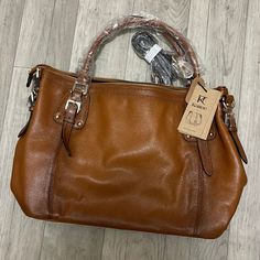 Comes With Tote Strap And Longer Strap For Crossbody Or Longer Style Tote Strap. New With Tags. Great Compartments Great Christmas Gift! Large Capacity Tan Leather Shoulder Bag, Tan Leather Bag For Fall, Fall Tan Leather Bag, Large Capacity Tan Leather Satchel, Brown On-the-go Bags With Adjustable Straps, Kate Spade Purse Pink, Cognac Satchel Tote With Gold-tone Hardware, Crossbody Saddle Bag, Cognac Shoulder Tote Bag With Gold-tone Hardware