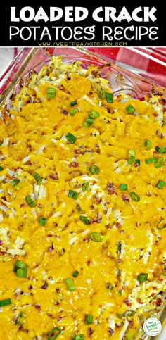 a casserole dish with cheese, green onions and seasoning in it on a checkered table cloth