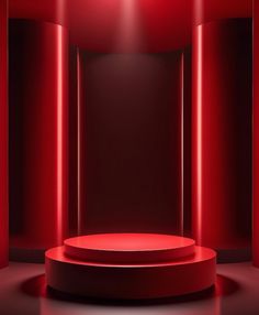 an empty stage with red lighting in the center and round podium on the floor, surrounded by columns