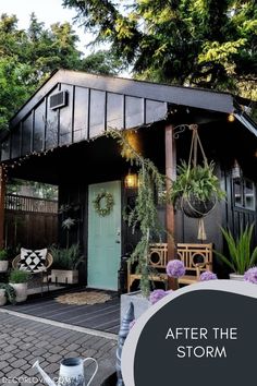 a black shed with potted plants on the front porch and text overlay that reads, after the storm