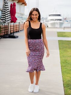 Hey there fashion lovers! Are you ready to add some fresh prints to your wardrobe? Our new Patterned Ruffle Hem Pencil Skirt is just what you need! This beautiful skirt will give your outfit a pop of color and flowy movement that will make you feel like a fashion icon. Pair it with a basic tee, jean jacket, and booties for a stylish and effortless look that will turn heads. Whether you're going out with friends or running errands, the Patterned Ruffle Hem Pencil Skirt is perfect for any occasion Trendy Stretch Pencil Skirt For Spring, Summer Patterned Bottoms With Lined Skirt, Spring Stretch Pencil Skirt For Day Out, Spring Printed Pencil Skirt, Patterned Mini Skirt For Spring, Fitted Multicolor Knee-length Bottoms, Trendy Pencil Skirt For Summer, Spring Patterned Lined Skirt, Trendy Printed Spring Skirt