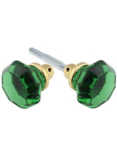 pair of green crystal stud earrings with gold plated posts and screws on white background